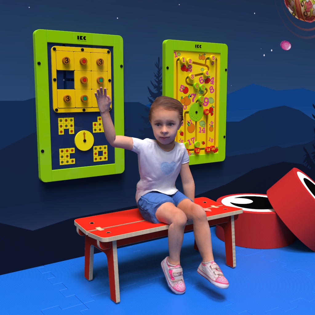 Op deze afbeelding ziet u een kind op de Buxus Bench red uit de kindermeubel collectie Buxus